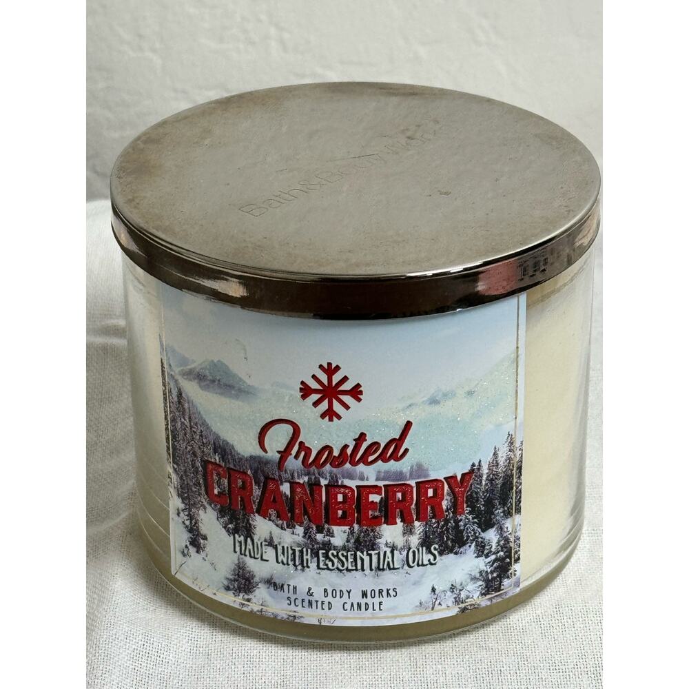 Bath & Body Works FROSTED
CRANBERRY w/ essential oils 3
Wick Jar Candle 14.5 oz